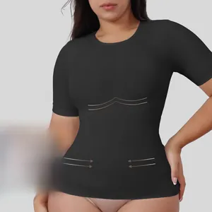 Detailed texture of black short sleeve waist cincher top with body shaping seams