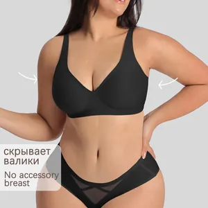 Detailed view of seamless black plus size bra with wide side wings to hide armpit fat