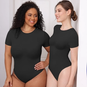 Short sleeve black bodysuit with crew neck showing slimming fit on two different body types