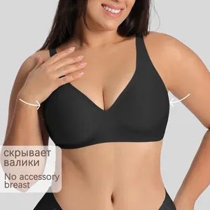Detail view of black seamless bra designed to smooth side fat and conceal accessory breasts
