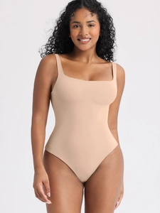 Detail of square neck seamless bodysuit in beige skin tone fabric with wide straps