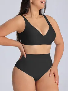 Detail of plus size black seamless lingerie set with deep V-neck and high waist panties