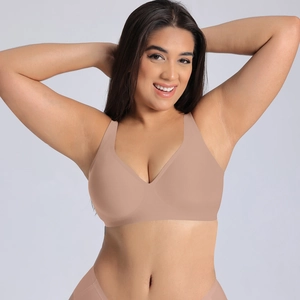 Detail view of plus size seamless nude lingerie set with deep V neck and elastic fabric