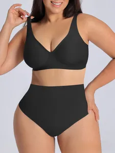 Detail of black seamless plus size lingerie set with wireless bra and high waist panties