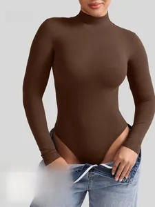 Detail of high neck long sleeve bodysuit in ribbed fabric showing tight slim fit