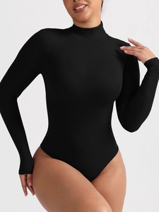 Close-up of black ribbed knit fabric on a slim fit turtleneck bodysuit for women