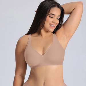 Close-up of nude seamless plus size wireless bra featuring smooth jelly glue support