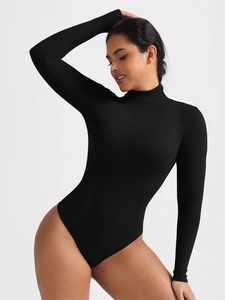 Detail of ribbed knit texture on a black long sleeve turtleneck bodysuit for women