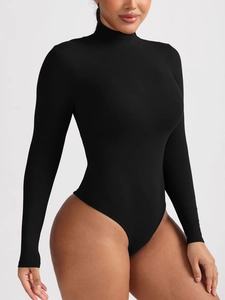 Close-up of black high-neck long-sleeve bodysuit featuring premium ribbed texture fabric
