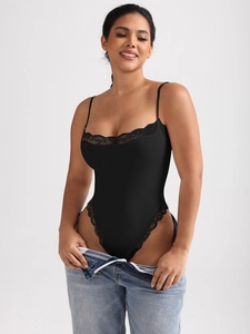 Close-up of black lace trim and fine straps on the slim-fit bodysuit for women