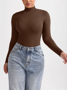 Detail of dark brown long sleeve turtleneck bodysuit with ribbed knit texture and slim fit