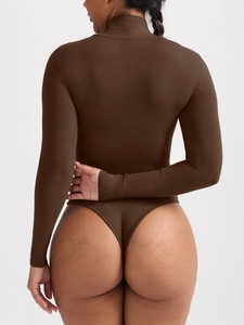 Detailed view of dark brown ribbed knit long sleeve thong bodysuit with high neckline