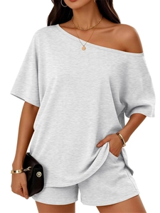 Detail view of light grey two-piece lounge set with off-shoulder top and knit texture