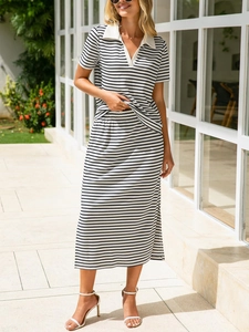 Detail of striped polo top and midi skirt set with elegant white contrast collar