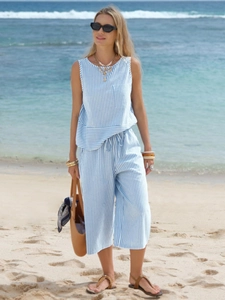 Detail of blue and white striped cotton summer set with sleeveless top and cropped pants