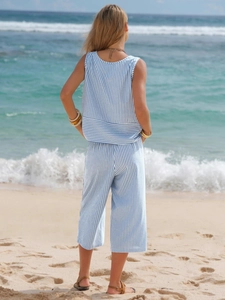 Detailed beach view of a blue and white striped cotton two-piece sleeveless summer set
