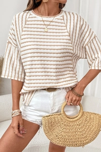 Detailed texture of striped crew neck T-shirt with crinkle fabric in a cozy casual style