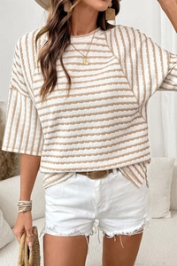 Detail of soft ribbed texture on casual striped T-shirt with comfortable crew neck design