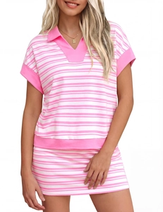 Detail of pink and white striped polo v-neck top with elastic cotton knit fabric