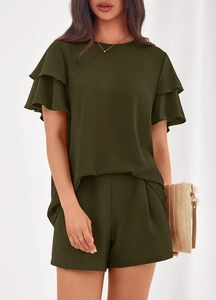 Detail of olive green summer set featuring ruffled sleeves and textured fabric