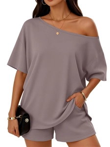Detail view of mauve lounge set featuring off-shoulder top with side slits and pocketed shorts