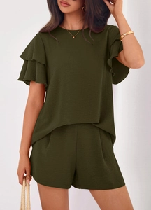 Detail of the ruffle sleeves and vertical texture on this green summer two-piece outfit