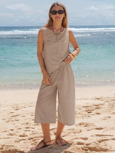 Detail of summer striped cotton two-piece set featuring sleeveless top and cropped pants