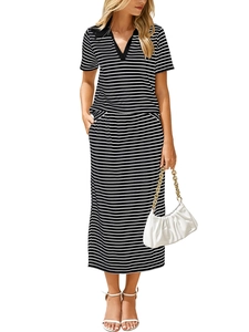 Detail of black and white striped knit two-piece set with V-neck top and high waist skirt