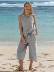 Detail of summer cotton striped two-piece set featuring sleeveless top and wide-leg pants