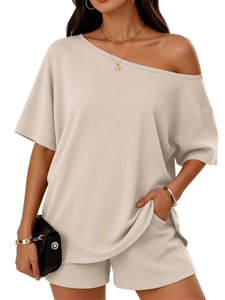 Detail shot of the textured cotton blend fabric on the off-shoulder casual set for women