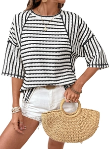 Detailed texture of women's striped crew neck T-shirt with subtle ripple fabric texture