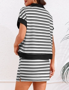 Close-up of black and white striped sports dress with a slim fit V-neck design