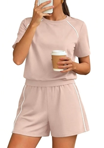 Detailed view of summer lounge set featuring contrast stripe details and drawstring shorts