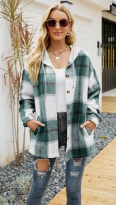 Detail of hooded plaid jacket with dark green check pattern and brown buttons
