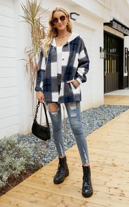 Detail of navy blue plaid hooded jacket with drawstring and front button closure