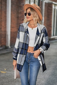 Detail view of blue and white plaid hooded shacket with buttons and adjustable drawstrings
