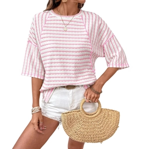 Women's pink and white striped crew neck T-shirt with textured seersucker fabric finish