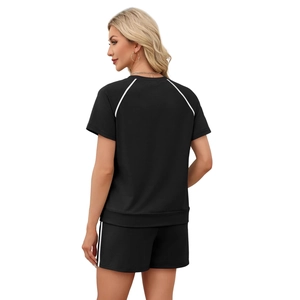 Women's black round neck short set with white side stripes shown from a rear perspective