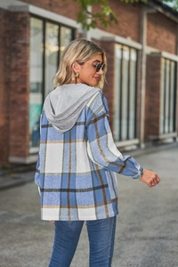 Detail of hooded plaid jacket showing high-quality brushed fabric and blue check pattern