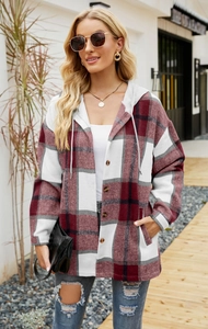 Detail of red and white plaid hooded shacket with drawstring hood and button-down front