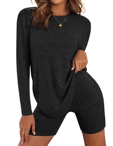 Detail of dark grey ribbed knit long-sleeve top and matching high-waisted shorts set