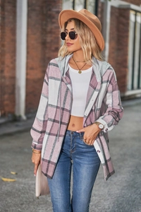 Outdoor street style shot of pink plaid hooded shacket with button-down closure