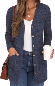 Detail of navy knit cardigan showing functional pockets and buttons for casual women's style
