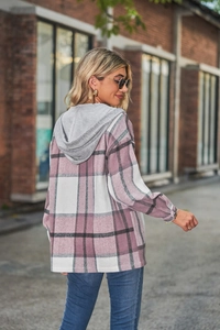 Detail of hooded plaid shacket featuring purple and white checkered fabric and casual fit