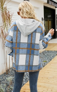 Detail of hooded plaid jacket showing the blue and white checkered pattern back