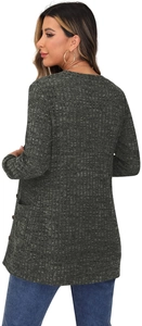 Detailed macro view of dark grey waffle knit texture and side pocket on the long cardigan