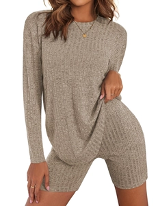 Close-up of ribbed knit texture on long sleeve top and matching shorts in taupe
