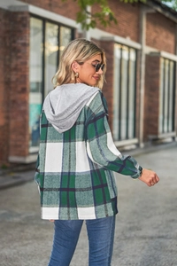 Detail of hooded plaid jacket with green and white check pattern and gray knit hood