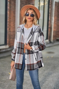 Detail of hooded plaid jacket with white grey and rust red checkered pattern for women