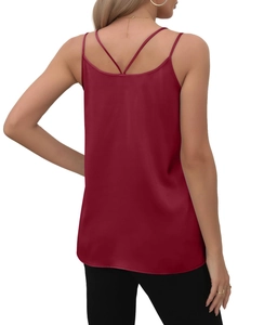 Detail view of the elegant burgundy satin tank top featuring a crisscross back tie design